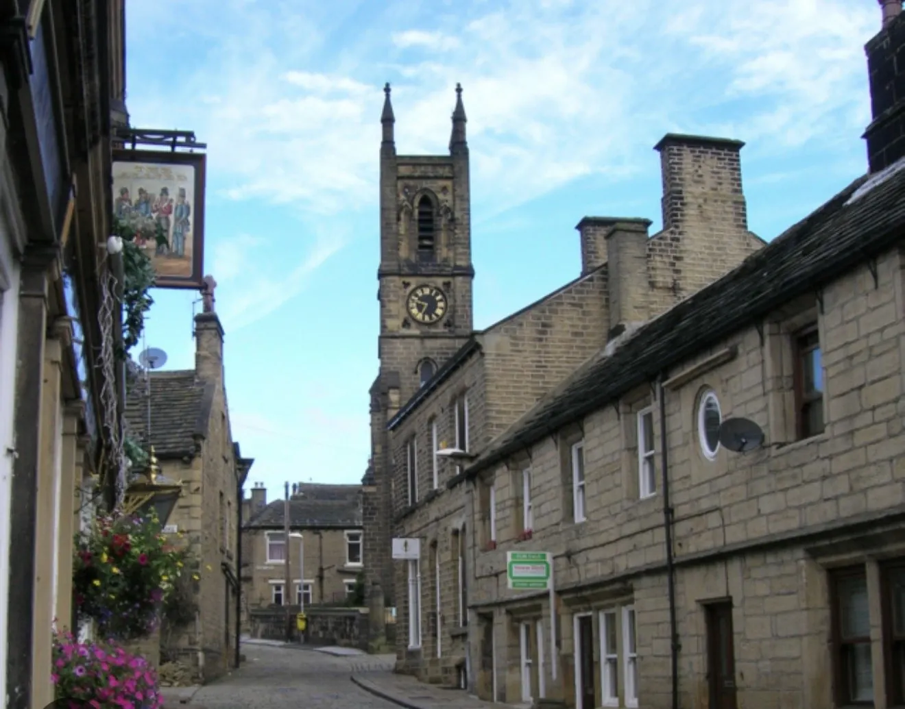 St Mary's Church tower above Honley village street